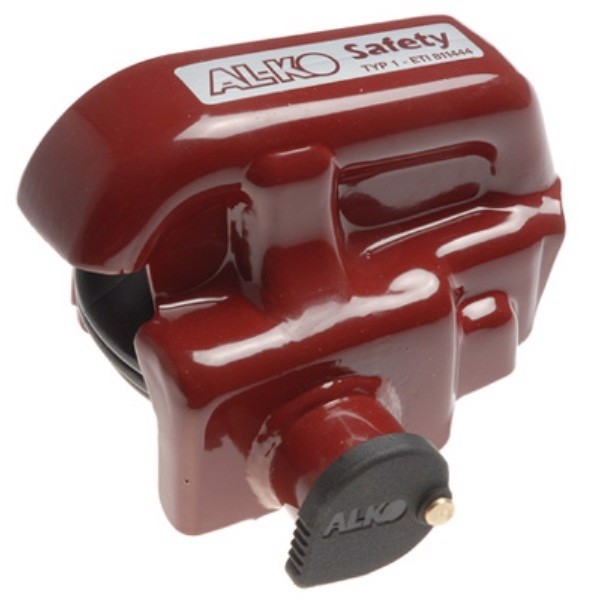 ALKO AKS 1300 Safety Plus lås med nyckel, mörk färg, märkt "AL-KO Safety".